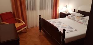 Postel nebo postele na pokoji v ubytování Apartman "Lara"