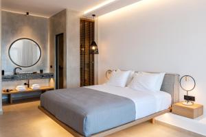 Cama ou camas em um quarto em Avra Mykonos