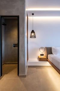 Cama ou camas em um quarto em Avra Mykonos