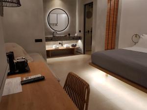 Cama ou camas em um quarto em Avra Mykonos