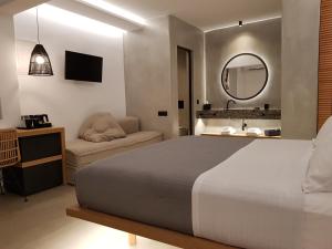 Cama ou camas em um quarto em Avra Mykonos