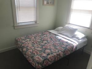 Katil atau katil-katil dalam bilik di Dhimas Apartments 209
