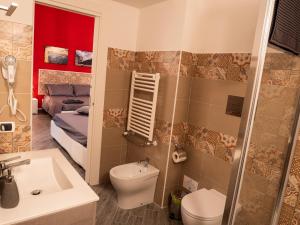 Et badeværelse på B&B Cosmoneapolitan + 69 billeder