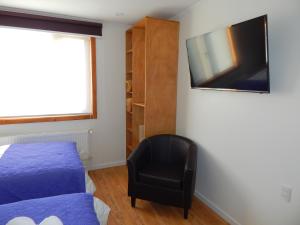 TV a/nebo společenská místnost v ubytování Hostal Buenavista Patagonia