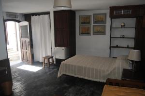 Postel nebo postele na pokoji v ubytování Lafkos Estate