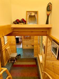 a view of a room with a bird sitting on a shelf at Sourdough Sunrise B&B in Seward