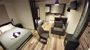 Postel nebo postele na pokoji v ubytování Perneia Rooms