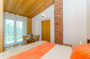 Postel nebo postele na pokoji v ubytování House Blanka