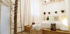Кровать или кровати в номере ROQUETAS BEACH HOUSE Apartamento fresco con Piscina