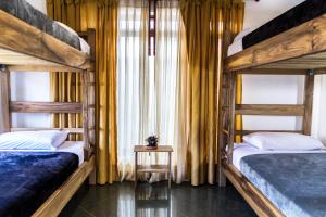 Krevet ili kreveti u jedinici u okviru objekta Nibiru Hostel