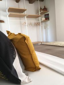 Łóżko lub łóżka w pokoju w obiekcie Il Posto Perfetto