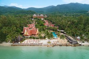 an aerial view of a resort on a beach at Santhiya Tree Koh Chang Resort in Ko Chang