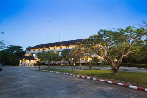 a building with a road in front of it at Eurasia Cha-Am Lagoon in Cha Am