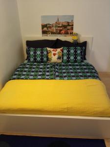 Posteľ alebo postele v izbe v ubytovaní Minion & Snoopy Apartman