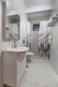 Kylpyhuone majoituspaikassa Premium Inn