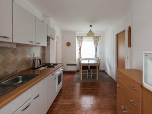 Kuchyň nebo kuchyňský kout v ubytování Apartmány Sen + 25 fotografií