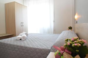Postel nebo postele na pokoji v ubytování Hotel Excelsior