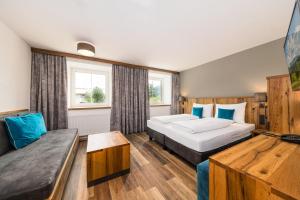 Katil atau katil-katil dalam bilik di Hotel Bräurup