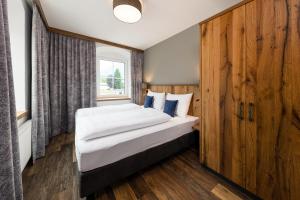 Katil atau katil-katil dalam bilik di Hotel Bräurup