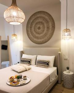 A bed or beds in a room at Amor di Casa