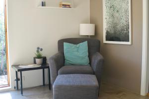 A seating area at Harpa Holiday Home - Birta Rentals