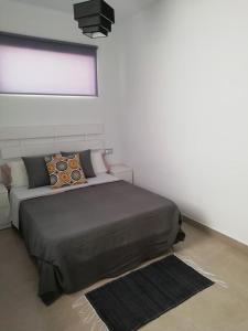 Cama o camas de una habitación en SAMPEDRO
