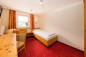 Katil atau katil-katil dalam bilik di Hotel Bräurup