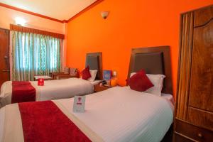 Katil atau katil-katil dalam bilik di Hotel Snowland