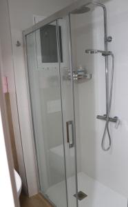 Koupelna v ubytování Archanda, apartamento en 1ª línea de playa + 15 fotografií