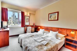 Posteľ alebo postele v izbe v ubytovaní Hotel Irottkö