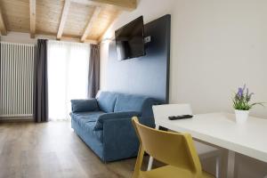 TV a/nebo společenská místnost v ubytování Casa Beccherie