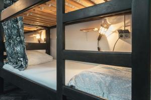 Posteľ alebo postele v izbe v ubytovaní Stay Swanky Hostel