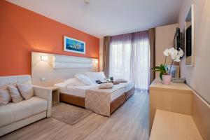 Postel nebo postele na pokoji v ubytování Hotel Maritimo