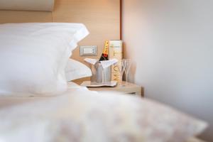 Postel nebo postele na pokoji v ubytování Hotel Maritimo