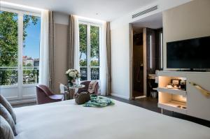 TV a/nebo společenská místnost v ubytování Boscolo Lyon Hotel & Spa