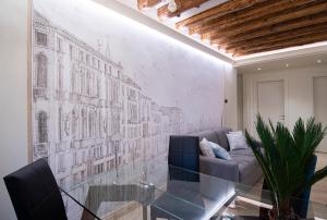 A seating area at CA' XXII MARZO BOUTIQUE