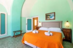 Кровать или кровати в номере Villarena Relais +104 фотографии