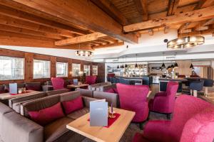 Zona de lounge sau bar la Alpenpark Resort Superior