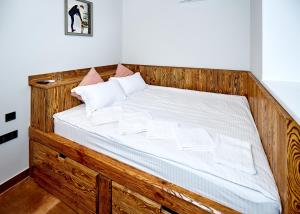 Postel nebo postele na pokoji v ubytování Tikhaya Gavan Hotel