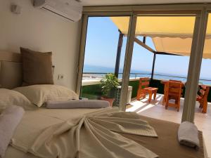 Ένα ή περισσότερα κρεβάτια σε δωμάτιο στο Hotel Perdja
