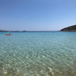 a large body of water with rocks in it at La marina in Cagliari