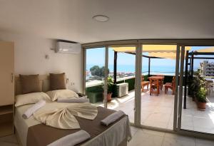 Ένα ή περισσότερα κρεβάτια σε δωμάτιο στο Hotel Perdja