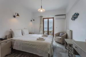 Postel nebo postele na pokoji v ubytování Vardia Hotel
