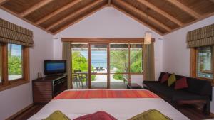 TV a/nebo společenská místnost v ubytování Kuredu Island Resort & Spa