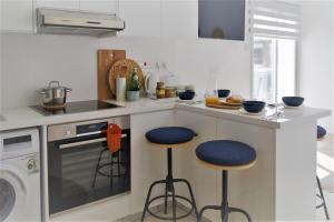 Küche/Küchenzeile in der Unterkunft Phaedrus Living: Seaside Luxury Flat Lighthouse 68