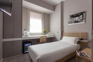 Postel nebo postele na pokoji v ubytování Best Quality Hotel Gran Mogol