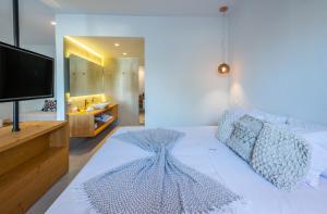 Postel nebo postele na pokoji v ubytování Dreambox Mykonos Suites