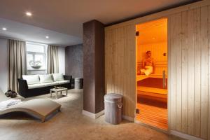 Postel nebo postele na pokoji v ubytování Mamaison Residence Sulekova Bratislava