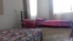 Letto o letti in una camera di Cabernet Tali