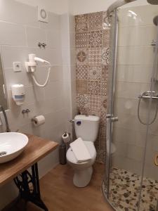 Koupelna v ubytování Hotel Carpe Diem